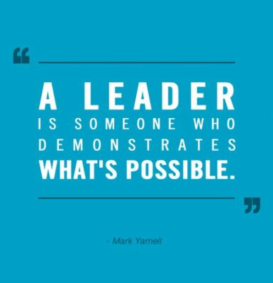 Leading Former Colleagues: Image is quote A leader is someone who demonstrates what's possible. Mark Yarnell"