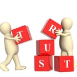 Customers Need to Trust: Image is the word trust spelled w/ building blocks.