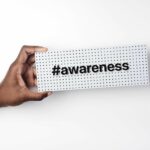 Care sooner: Image is a sign that says Awareness.