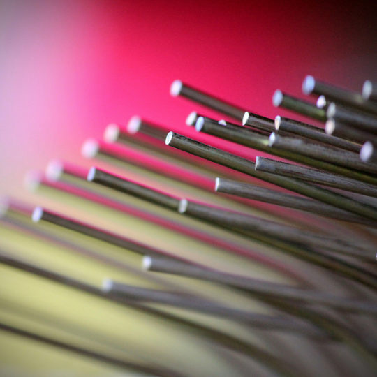 Common People Skills Mistakes: Image is thin metal rods projecting at us.