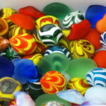 Discover Employee Talents: Image is diverse colored stones.