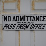 Leadership Bias: Image is a closed door w/ sign that says no admittance without pass from office.