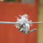 Hard Human Consequences: Image is frayed rope knot.