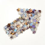 Initial Negative Reaction: Image is arrow made of up jigsaw puzzle pieces.