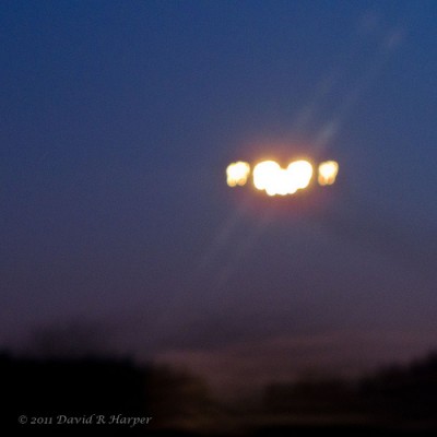 Customer Service Recovery: Image are lights of airplane landing.