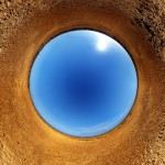 Leadership Strength: Image looks like crater w/ blue sky in center.