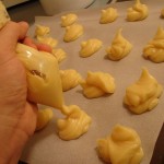 Being Process Driven: Image is a pastry bag creating identical cookies.