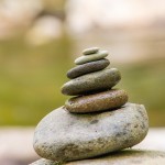 Team Harmony: Image are zen rocks stacked but tipping.